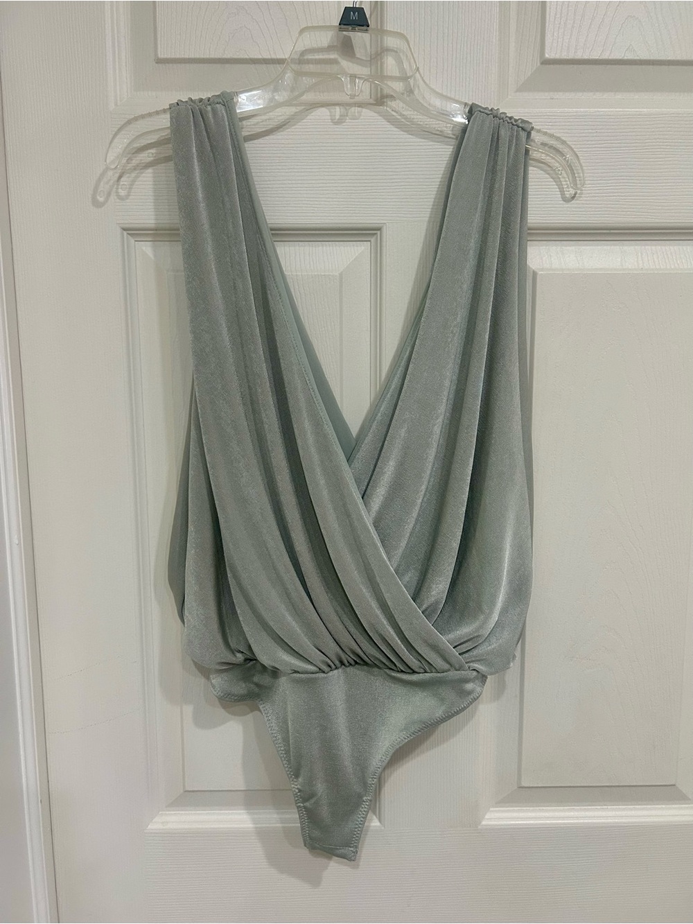 Free People Draped Deep-V Bodysuit in Sage Green/subtle metallic look. SMALL